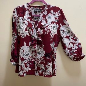 Paul Lagerfeld designer blouse. Burgundy with gray and white floral design.